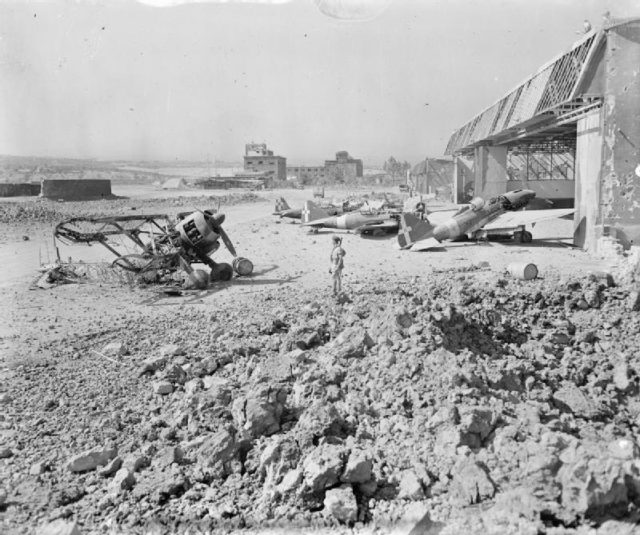 Wrecked Italian aircraft at Catania airfield, Sicily, after RAF occupation